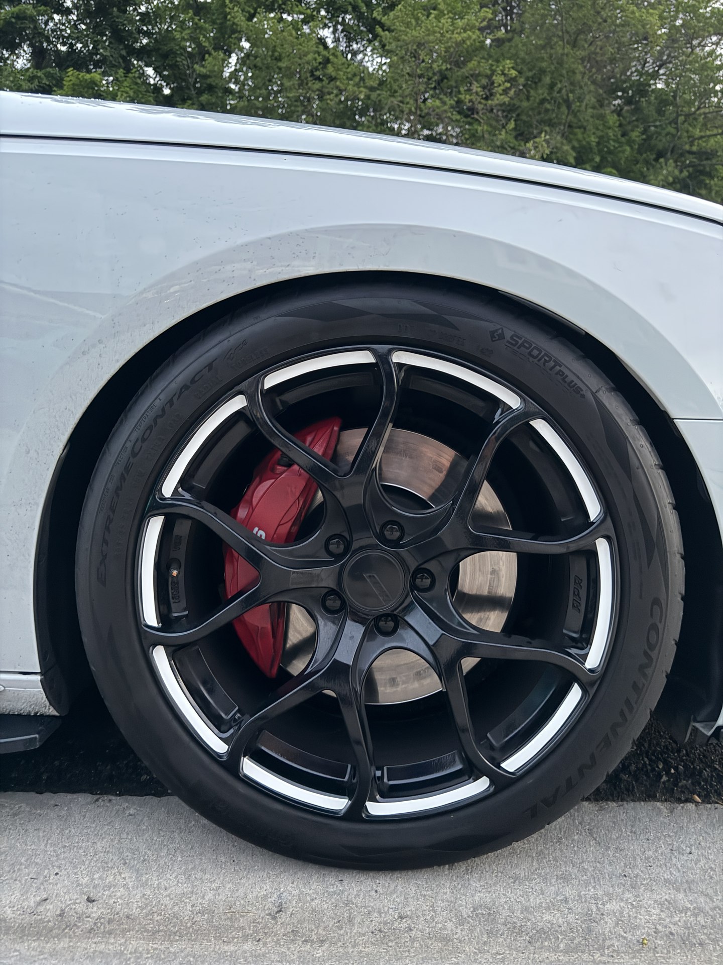Custom Vehicle Details — red brake caliper detail by Coastal Wraps